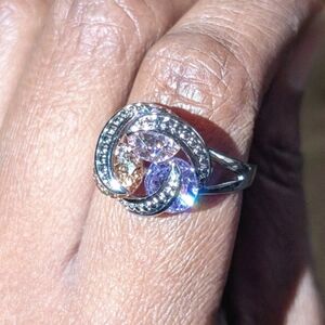 Sparkling Zirconia With Pink,yellow, and Purple Rotating Gemstone Design Sz 8